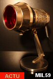 Lampe Sollux "Grandiosa", modèle 54, articulée, métal nickelé, poignées en bakélite, filtre rouge.